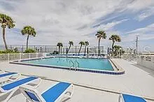 a view of a swimming pool and a terrace
