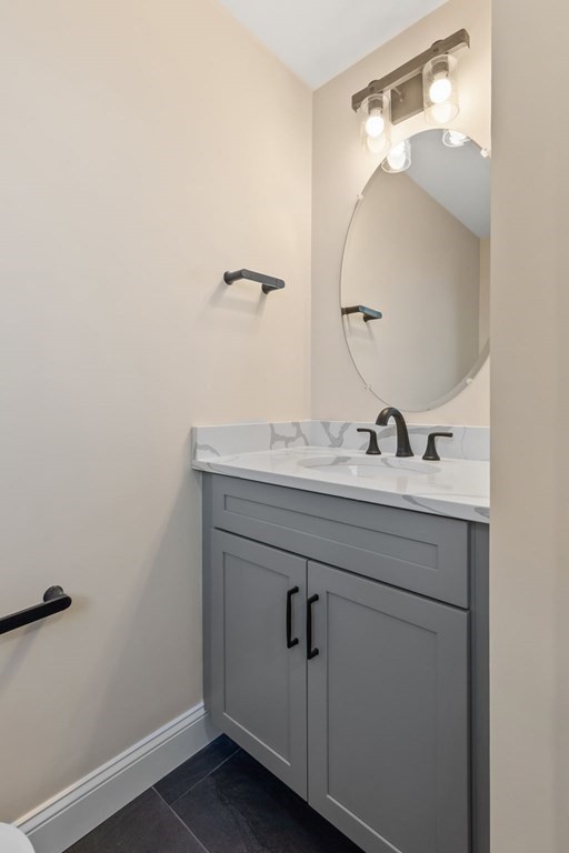 59 Riverview Avenue Danvers, MA 01923 - Photo 21 of 30 a bathroom with a sink and mirror