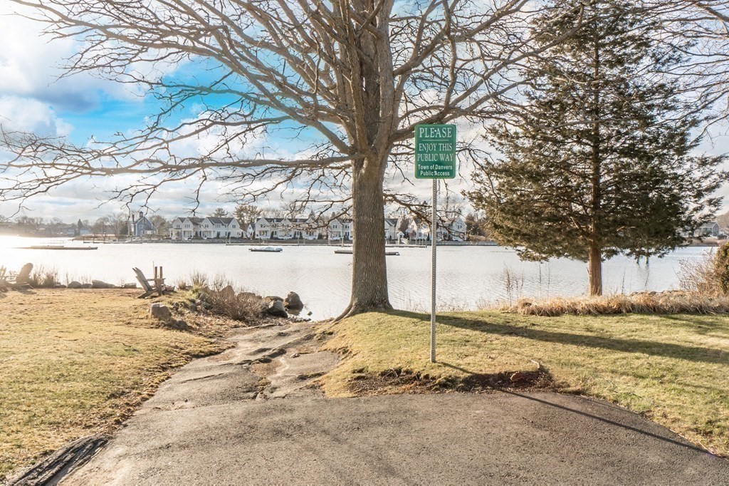 59 Riverview Avenue Danvers, MA 01923 - Photo 24 of 30 a view of a lake with a yard