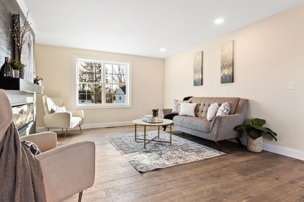 59 Riverview Avenue Danvers, MA 01923 - Photo 25 of 30 a living room with furniture and a window
