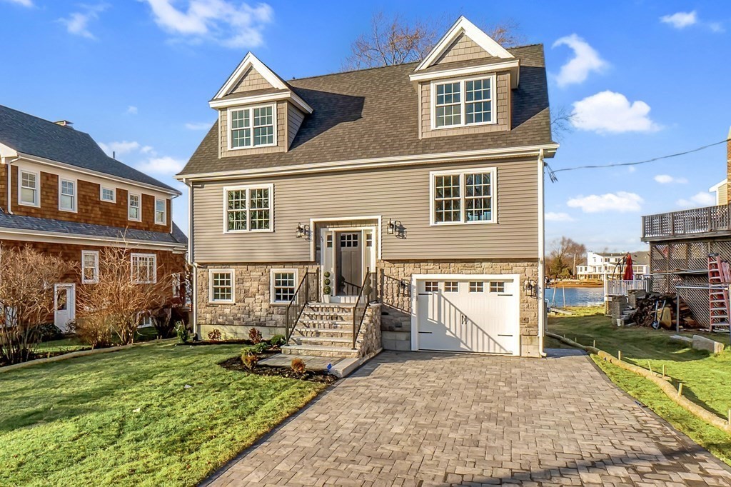 59 Riverview Avenue Danvers, MA 01923 - Photo 26 of 30 a front view of a house with a yard