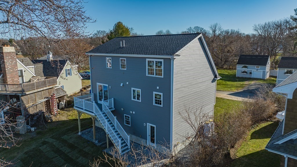 59 Riverview Avenue Danvers, MA 01923 - Photo 30 of 30 a view of a house with a yard