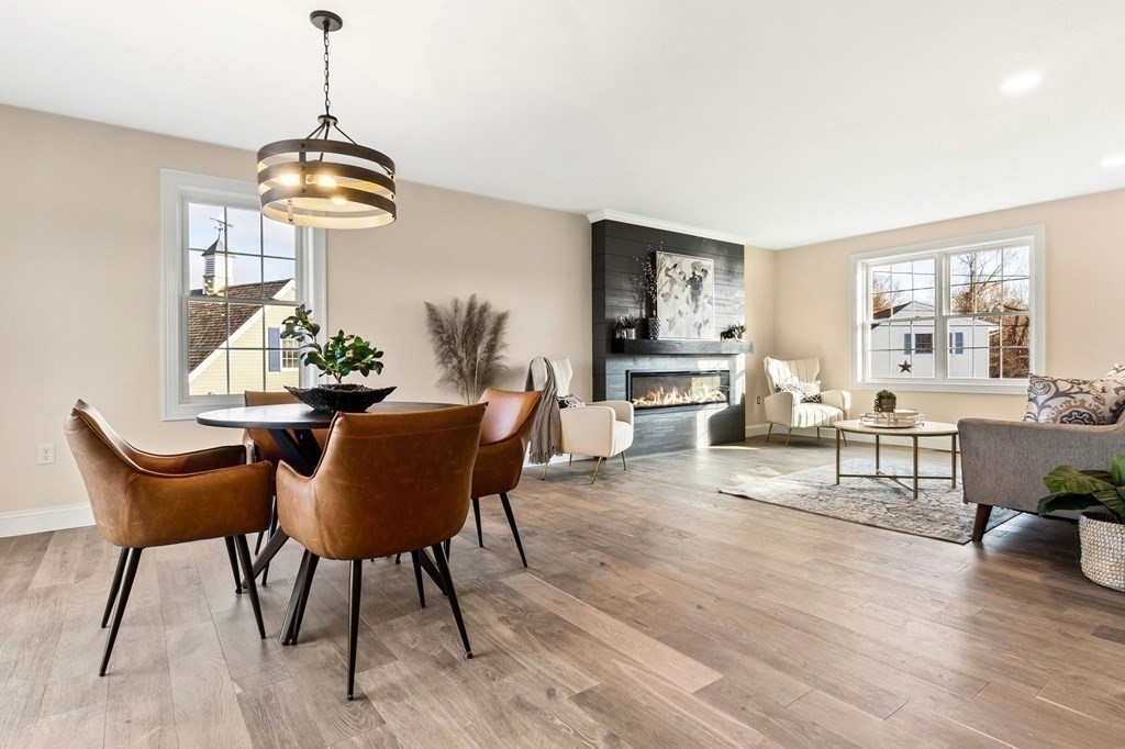 59 Riverview Avenue Danvers, MA 01923 - Photo 3 of 30 a view of a dining room with furniture window and wooden floor