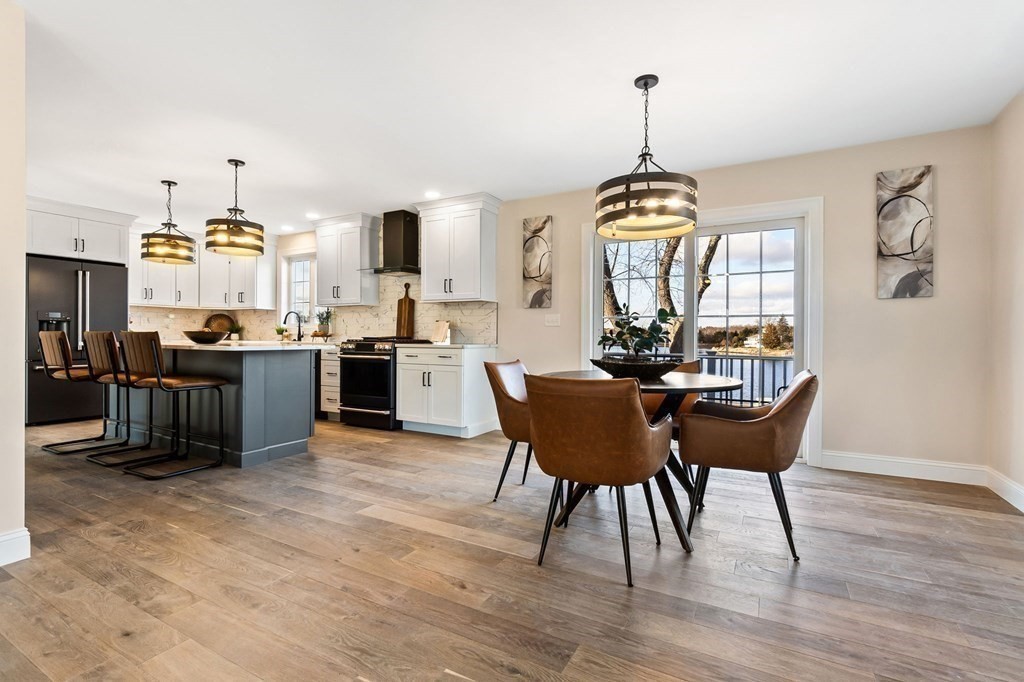 59 Riverview Avenue Danvers, MA 01923 - Photo 7 of 30 a view of a dining room with furniture window and wooden floor