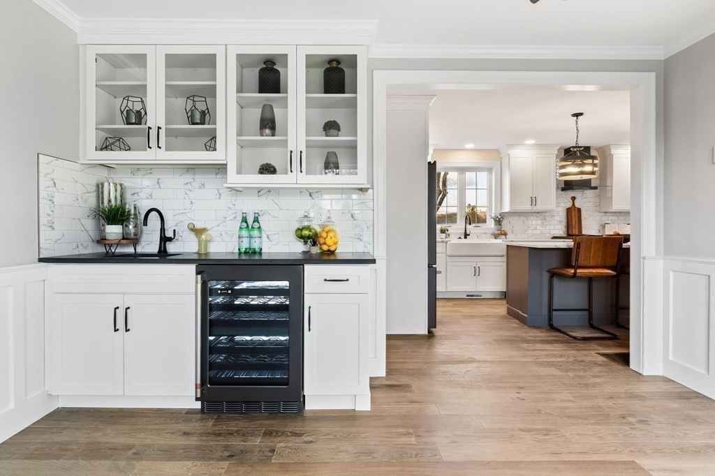 59 Riverview Avenue Danvers, MA 01923 - Photo 8 of 30 a kitchen with a cabinets and wooden floor
