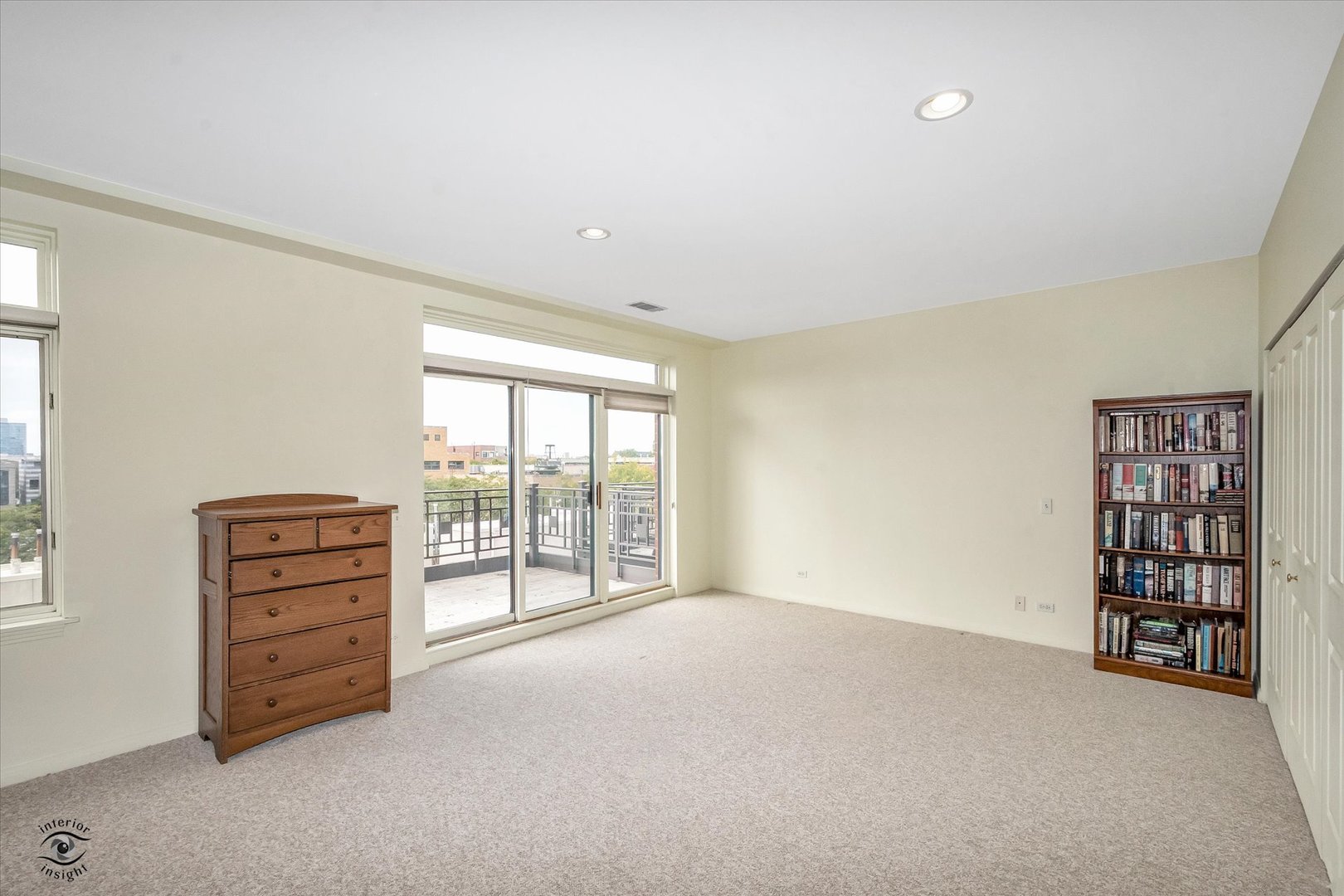 1414 North Wells Street, Unit 508 Chicago, IL 60610 - Photo 14 of 28 an empty room with windows and closet