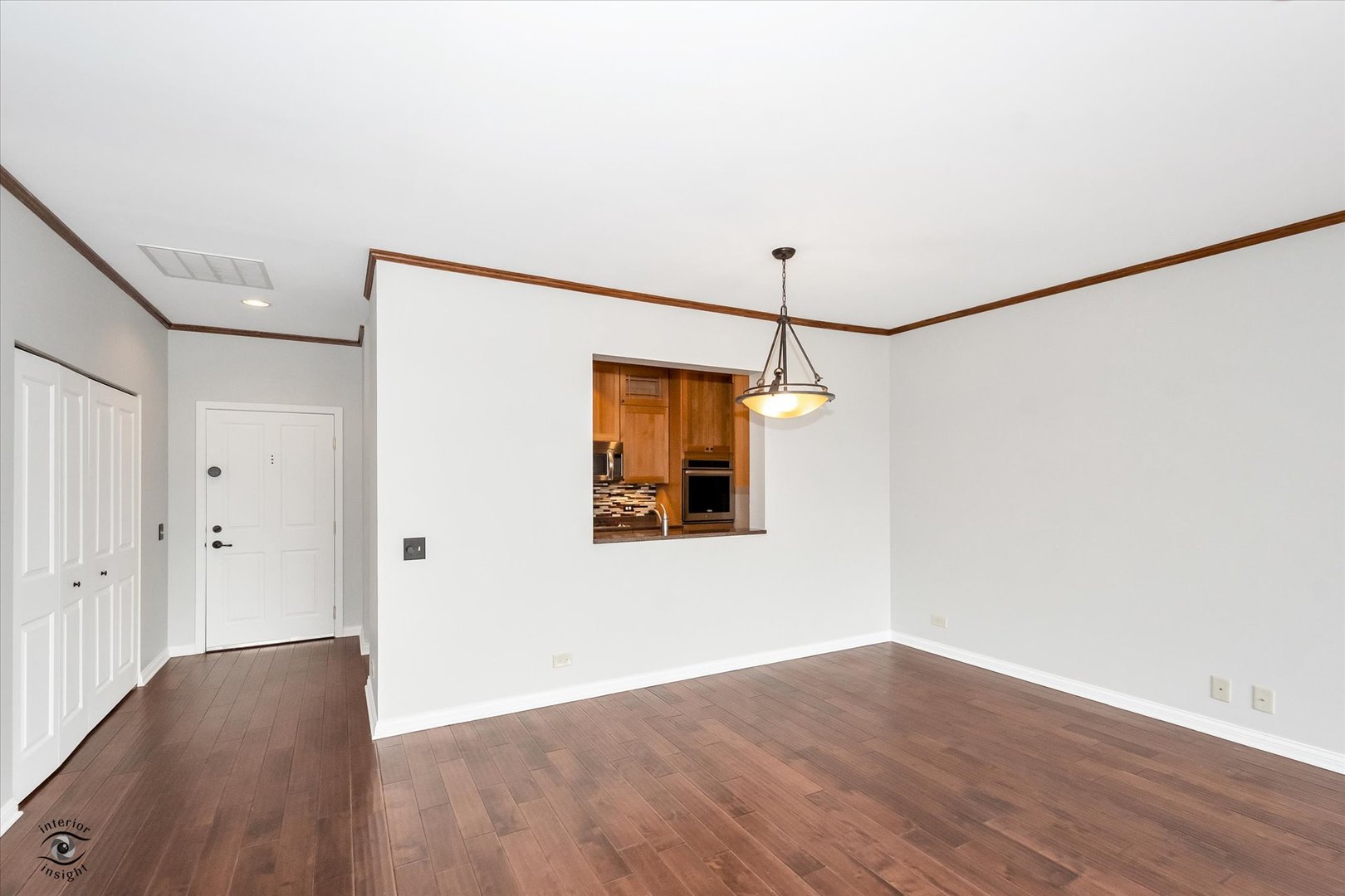 1414 North Wells Street, Unit 508 Chicago, IL 60610 - Photo 5 of 28 a view of a room with wooden floor