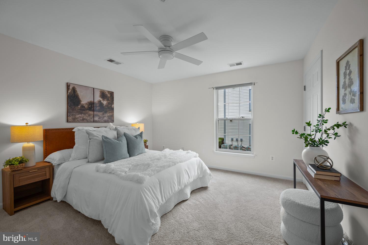 2011 Rudy Serra Drive, Unit 1C Eldersburg, MD 21784 - Photo 19 of 36 a bedroom with bed couch and window