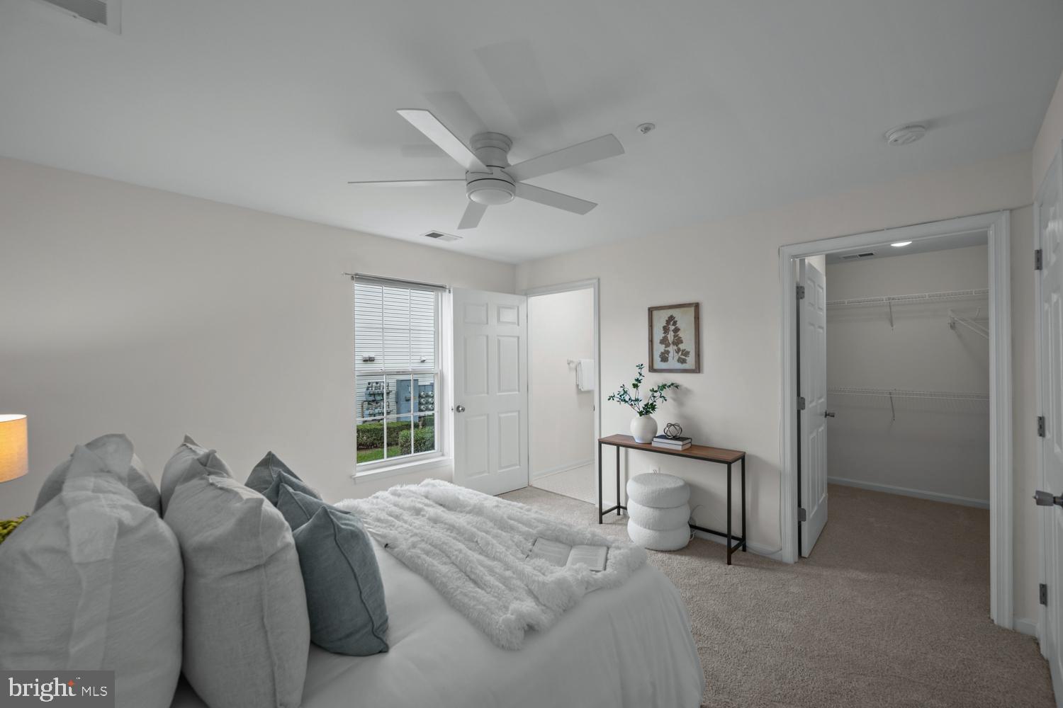 2011 Rudy Serra Drive, Unit 1C Eldersburg, MD 21784 - Photo 20 of 36 a bedroom with a bed and a large window