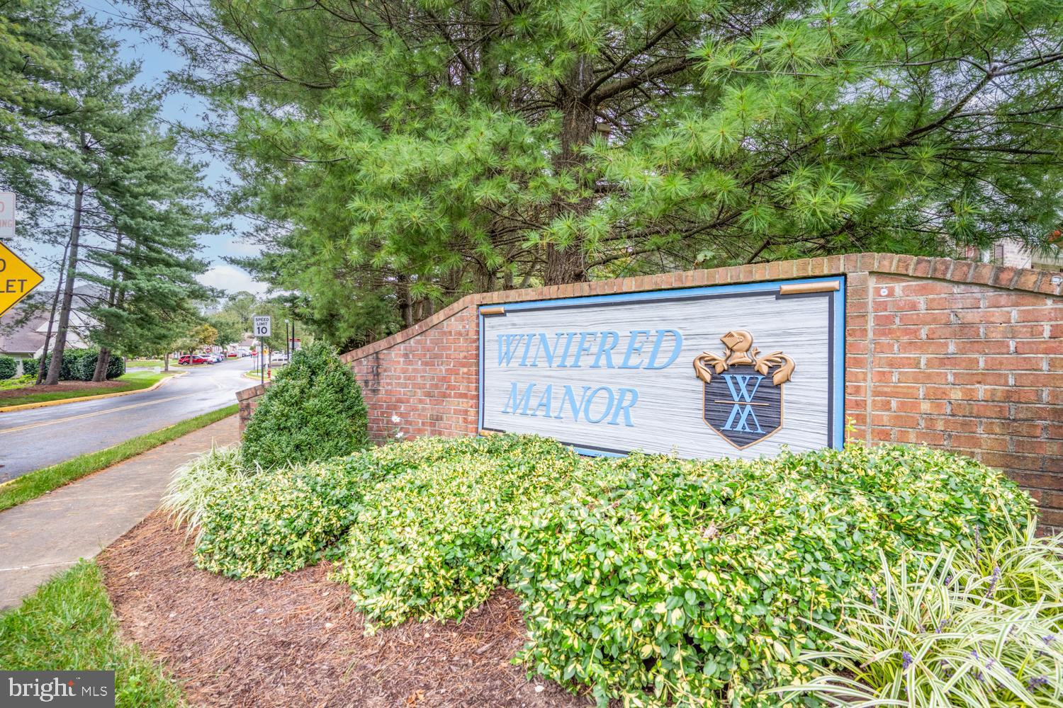 2011 Rudy Serra Drive, Unit 1C Eldersburg, MD 21784 - Photo 34 of 36 a sign that is on a wooden wall