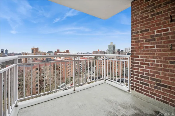 a view of a balcony with city view
