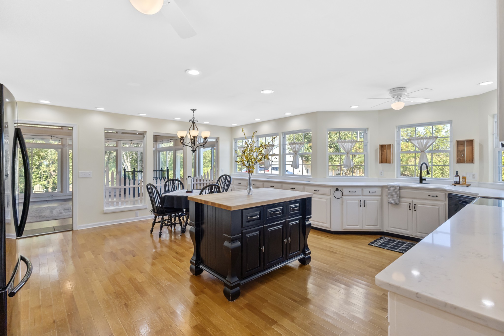 2960 Canoe Branch Road Lebanon, TN 37087 - Photo 29 of 80 a kitchen with stainless steel appliances granite countertop a stove and a wooden floors