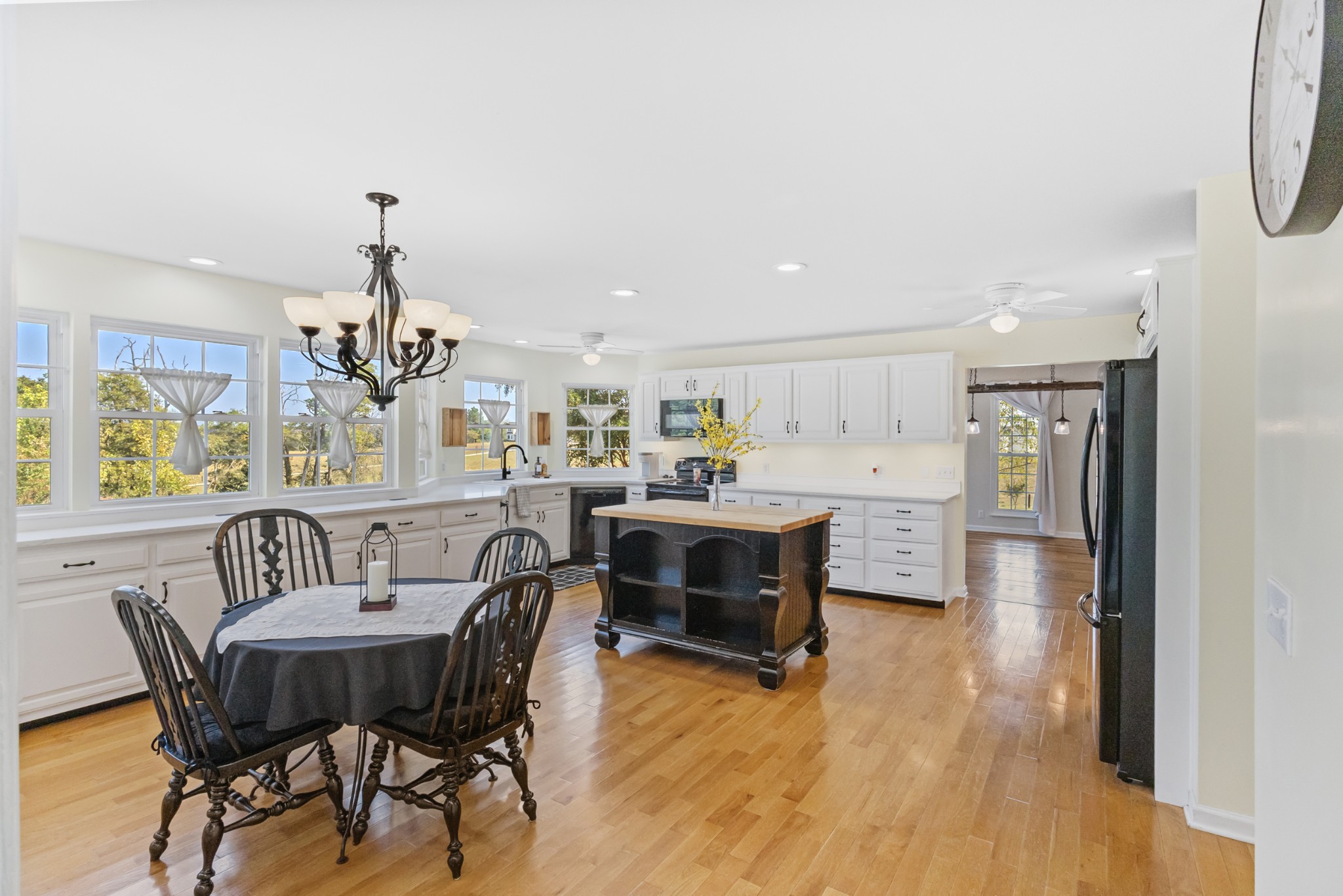 2960 Canoe Branch Road Lebanon, TN 37087 - Photo 34 of 80 a view of a dining room with furniture window and wooden floor