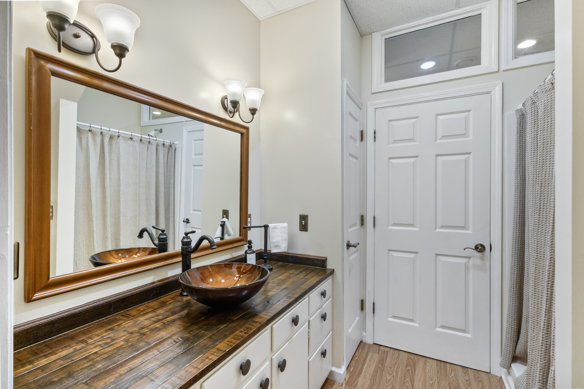 2960 Canoe Branch Road Lebanon, TN 37087 - Photo 79 of 80 a bathroom with a granite countertop sink and a mirror