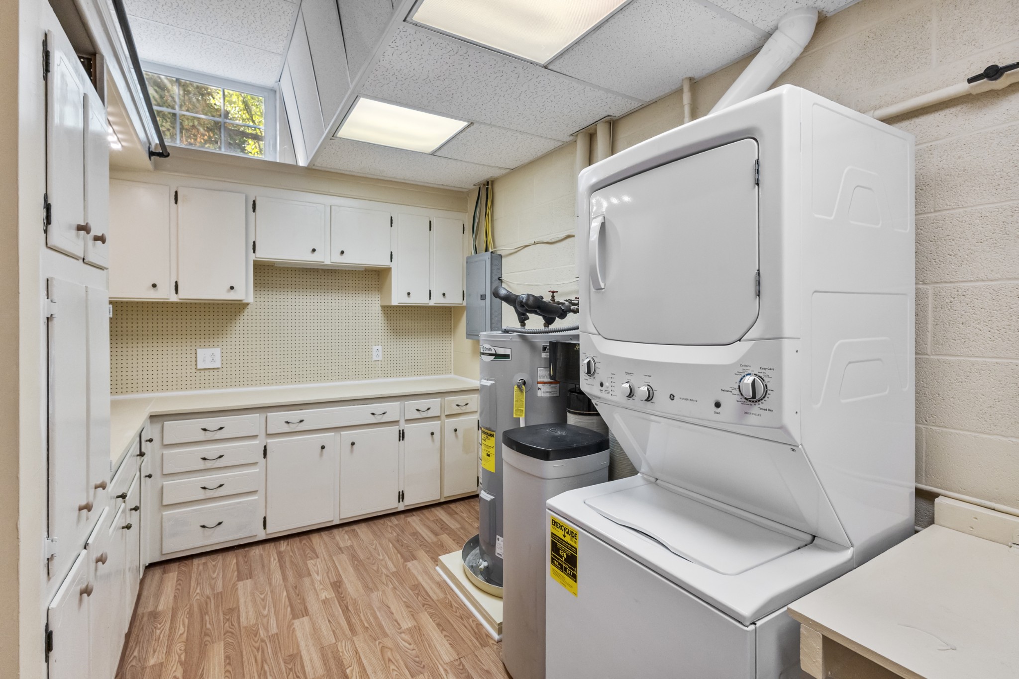 2960 Canoe Branch Road Lebanon, TN 37087 - Photo 80 of 80 a utility room with cabinets washer and dryer