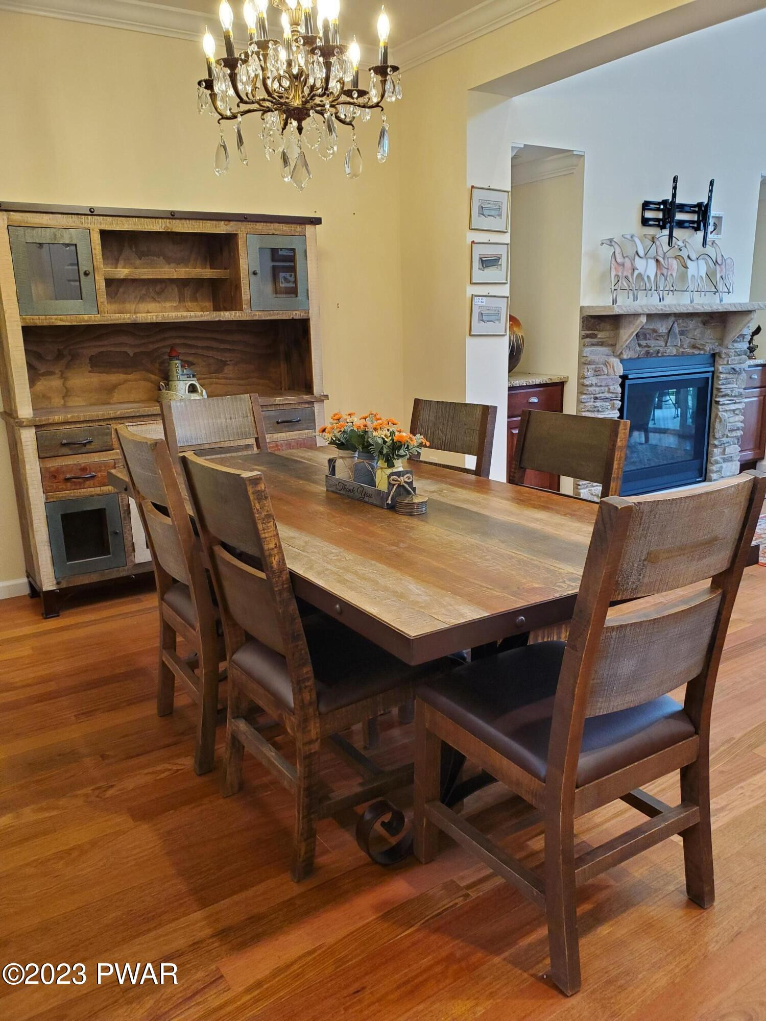 806 MacIntosh Way Matamoras, PA 18336 - Photo 12 of 53 a view of a dining room with furniture and wooden floor