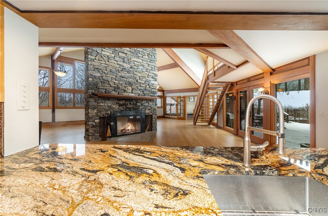 6987 Frank Long Road Pompey, NY 13078 - Photo 15 of 40 The central chefs kitchen has views of the livingr