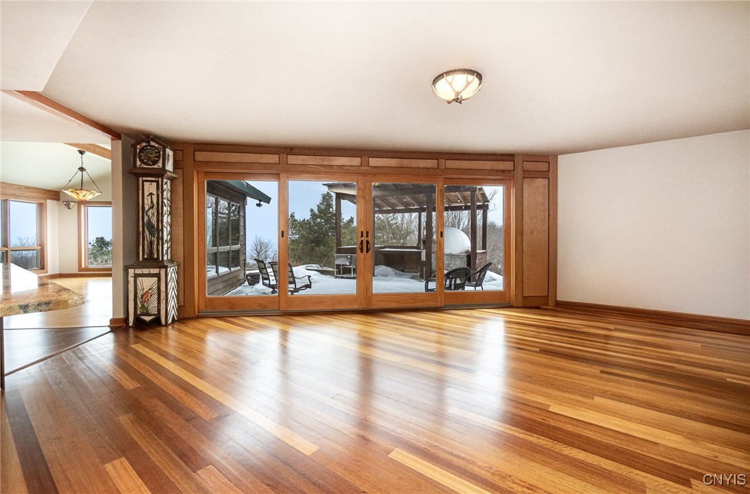 6987 Frank Long Road Pompey, NY 13078 - Photo 20 of 40 Stunning floors frame this living space open to t
