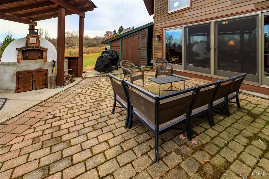 6987 Frank Long Road Pompey, NY 13078 - Photo 22 of 40 Enjoy the Pizza Oven and outdoor living area off t