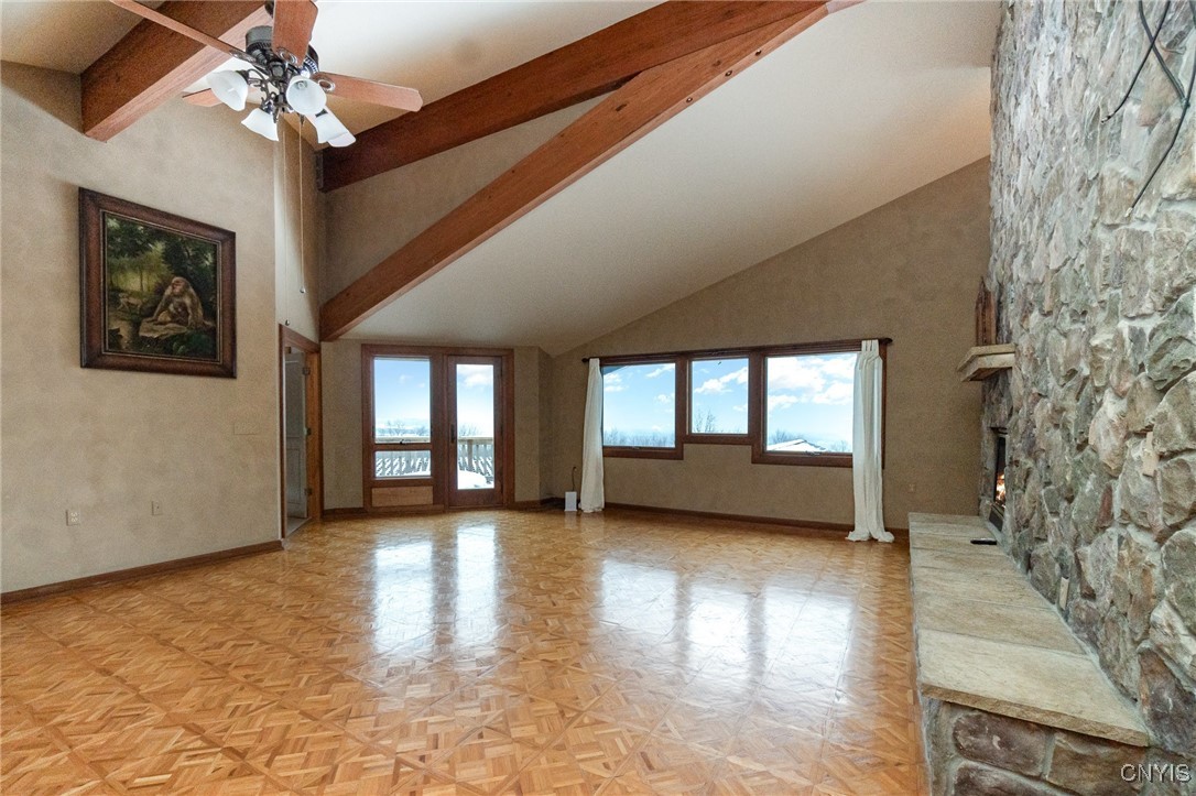 6987 Frank Long Road Pompey, NY 13078 - Photo 27 of 40 Primary bedroom offers fireplace and balcony for a