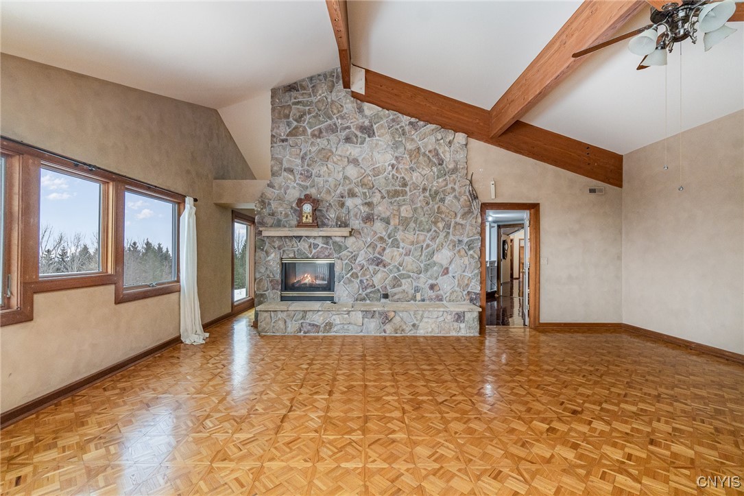 6987 Frank Long Road Pompey, NY 13078 - Photo 28 of 40 Cozy double sided fireplace in the primary ensuite