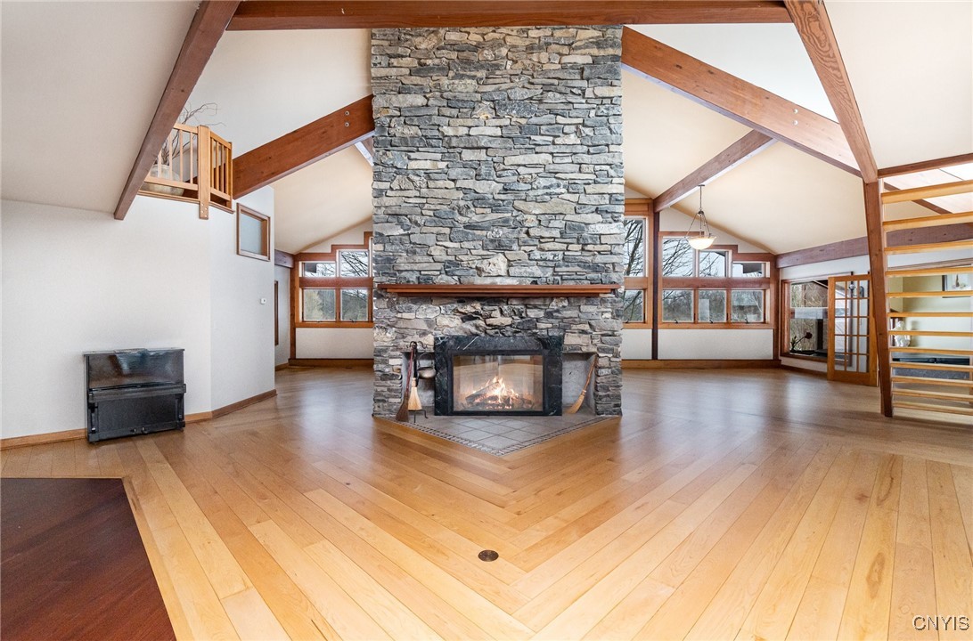 6987 Frank Long Road Pompey, NY 13078 - Photo 7 of 40 Expansive living space on both sides of the firepl