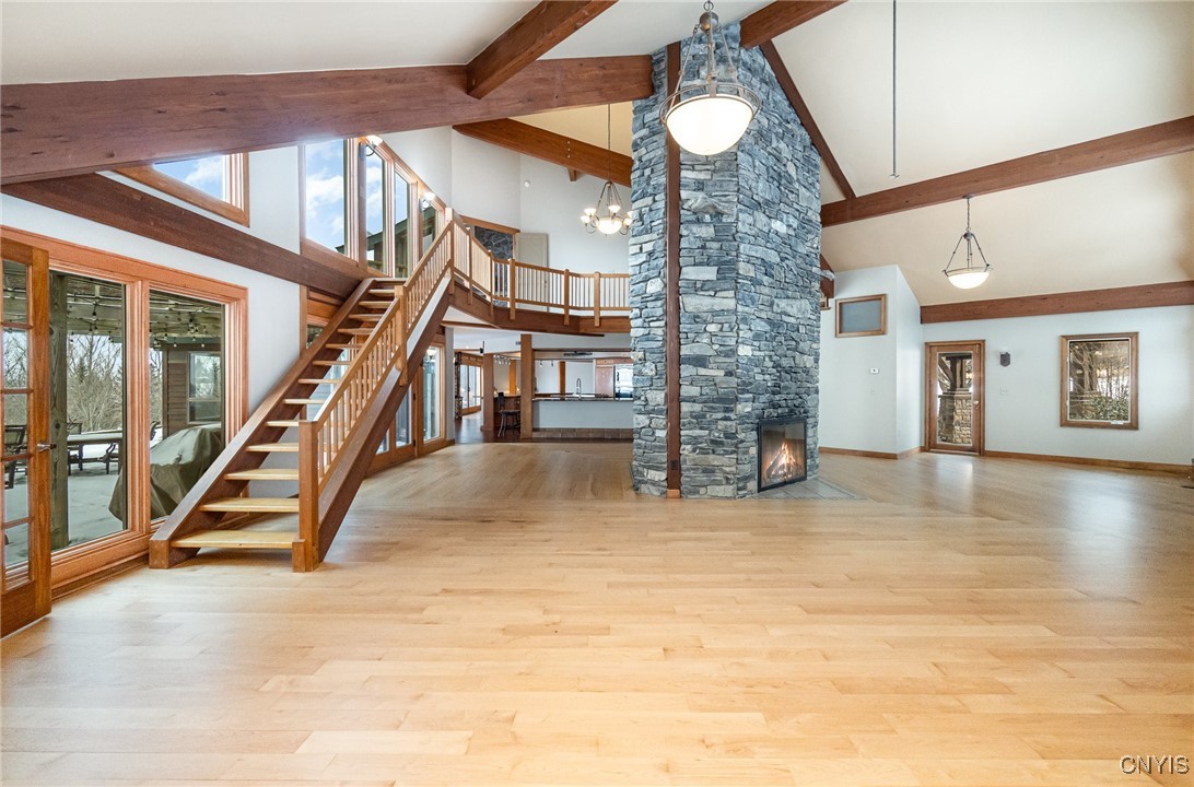 6987 Frank Long Road Pompey, NY 13078 - Photo 8 of 40 Gleaming hardwood floors highlight the open floorp