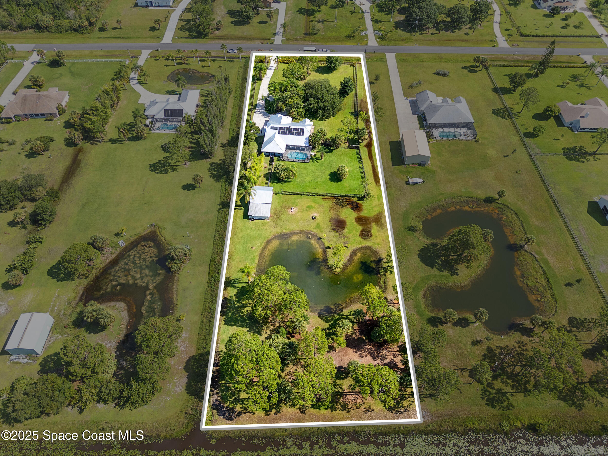 239 Deer Run Road Palm Bay, FL 32909 - Photo 3 of 43 view of a garden