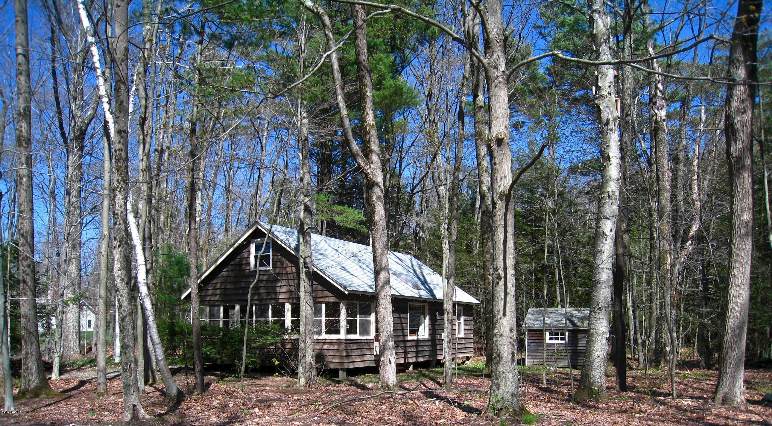 22 Housatonnuck Road Stockbridge, MA 01262 - Photo 17 of 21 a view of a house with a yard
