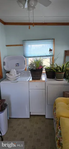 a bedroom with a bed and a mirror