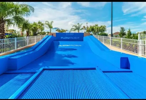a kitchen with a table and chairs