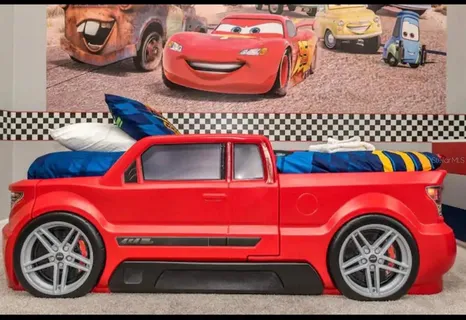 a large white bed in a white room