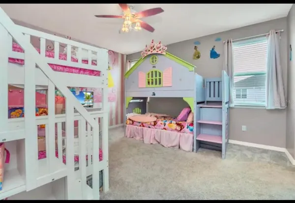 a large white kitchen with lots of white appliances