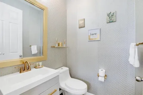 a bedroom with a bed and a table