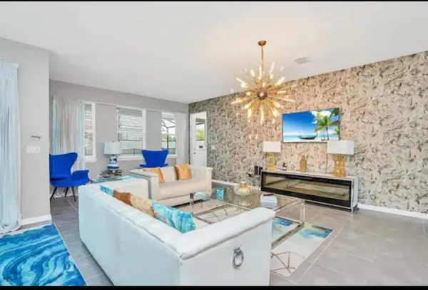 a kitchen with stainless steel appliances kitchen island granite countertop a sink and cabinets