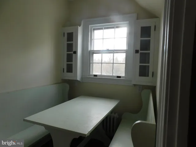 a view of a room that has a window in it
