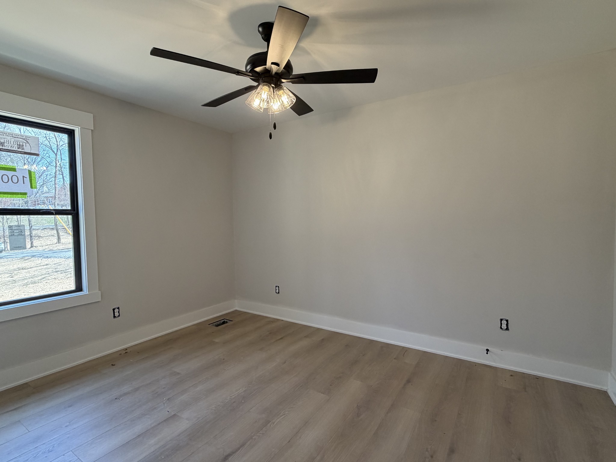1007 Mt Olive Road Westmoreland, TN 37186 - Photo 19 of 31 an empty room with a window and a fan
