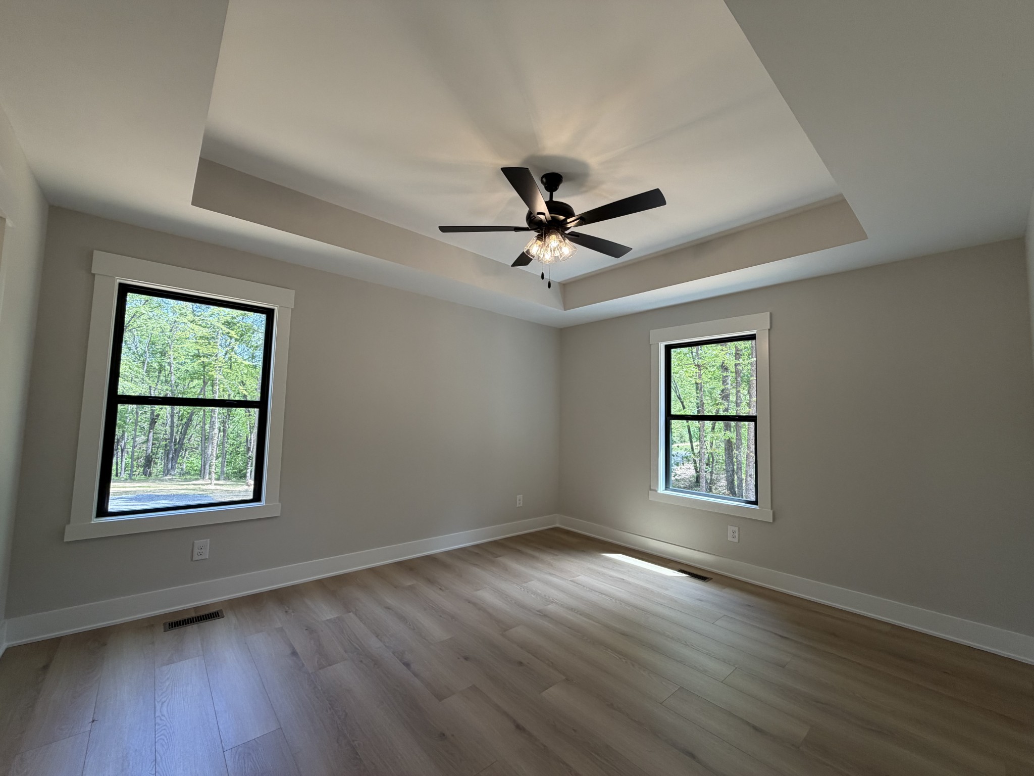 1007 Mt Olive Road Westmoreland, TN 37186 - Photo 27 of 31 a view of an empty room with wooden floor and a window