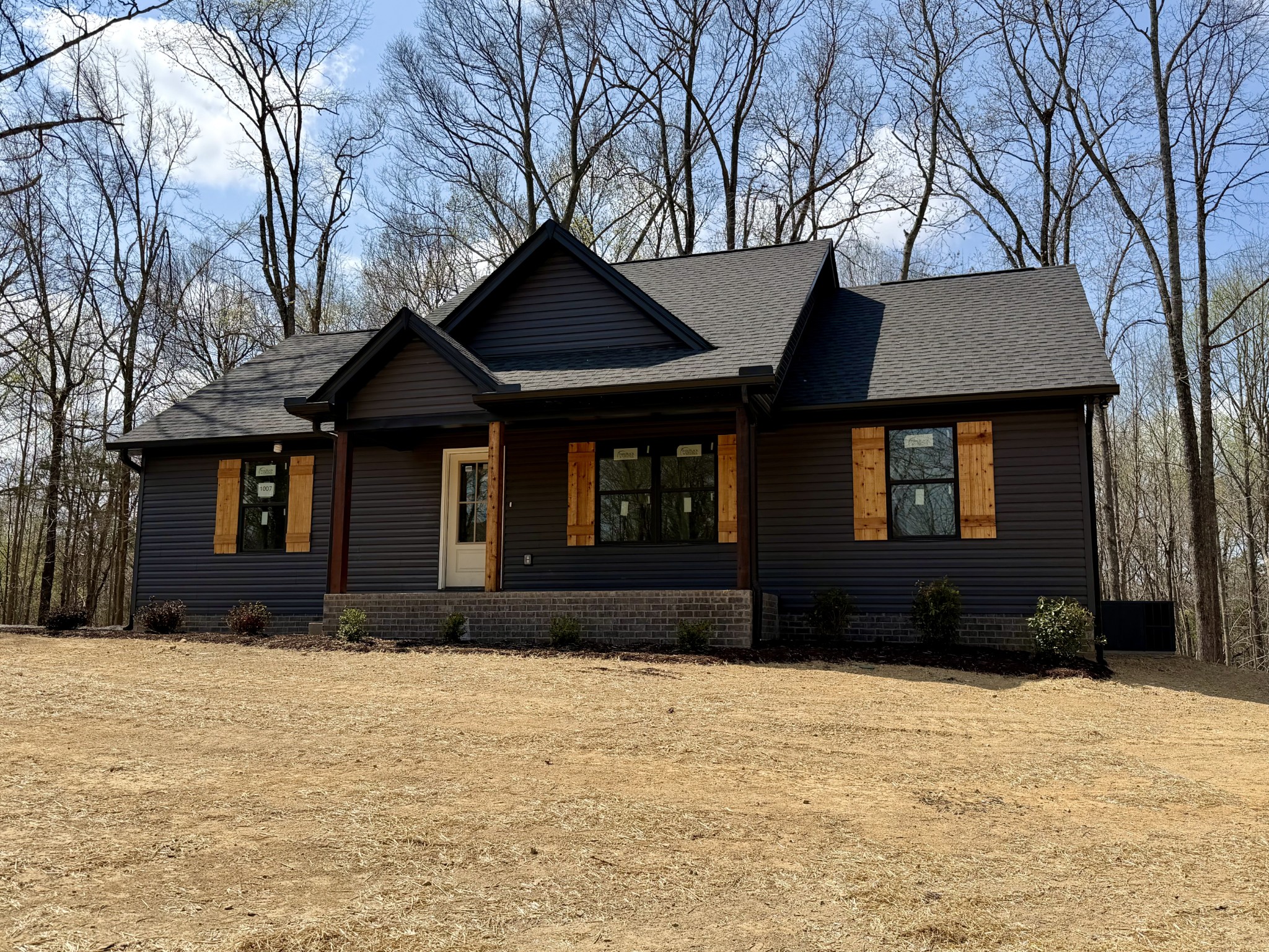 1007 Mt Olive Road Westmoreland, TN 37186 - Photo 6 of 31 a front view of a house with a yard