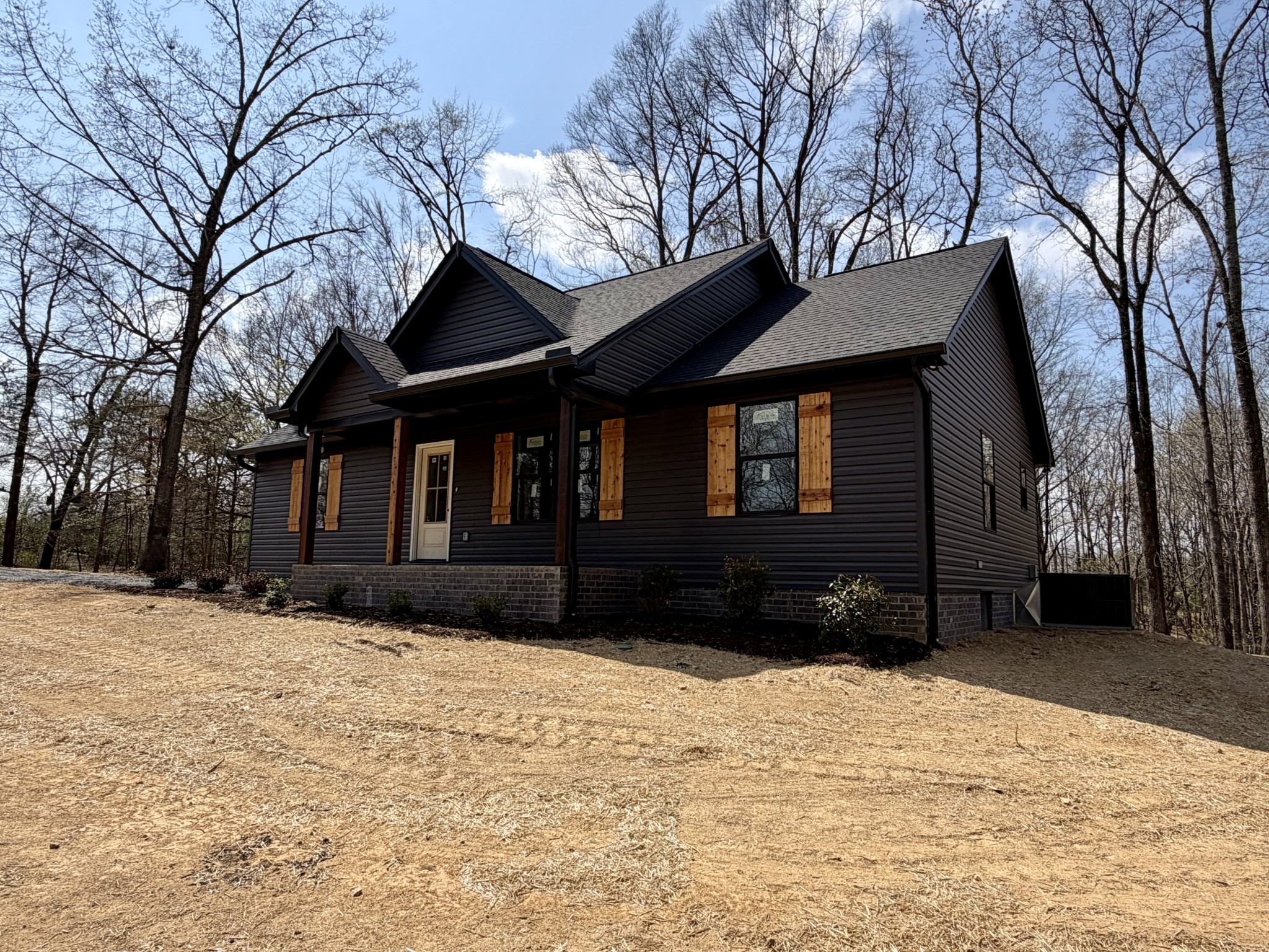 1007 Mt Olive Road Westmoreland, TN 37186 - Photo 7 of 31 a front view of house with yard covered in snow