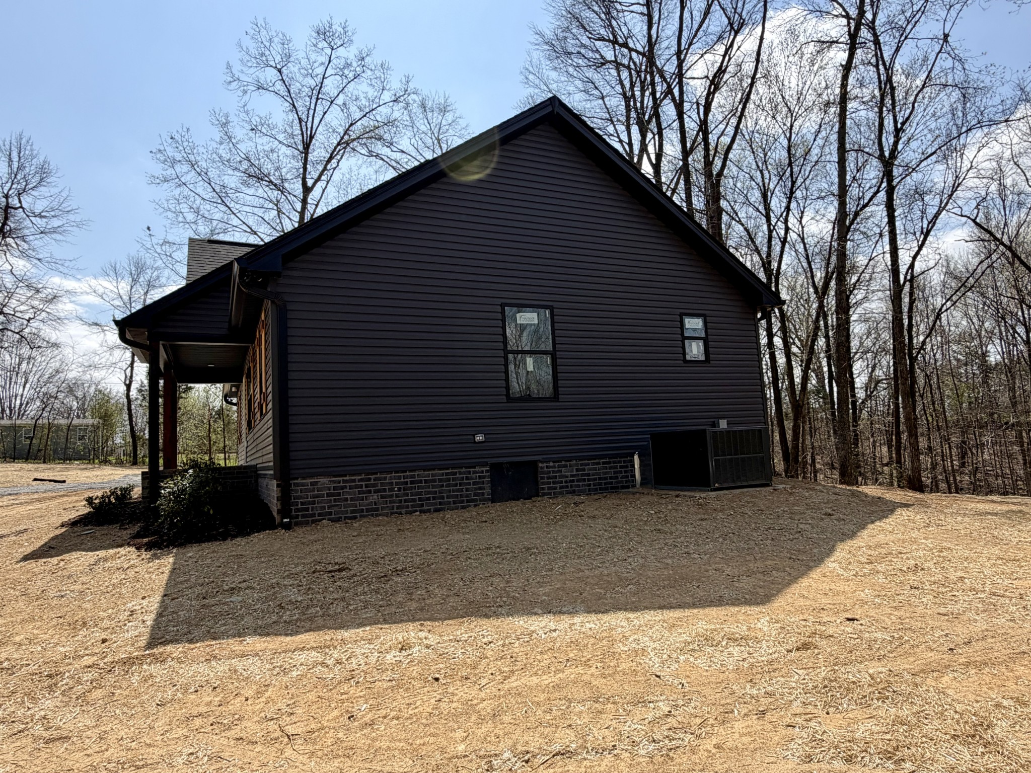 1007 Mt Olive Road Westmoreland, TN 37186 - Photo 8 of 31 a front view of a house with a yard