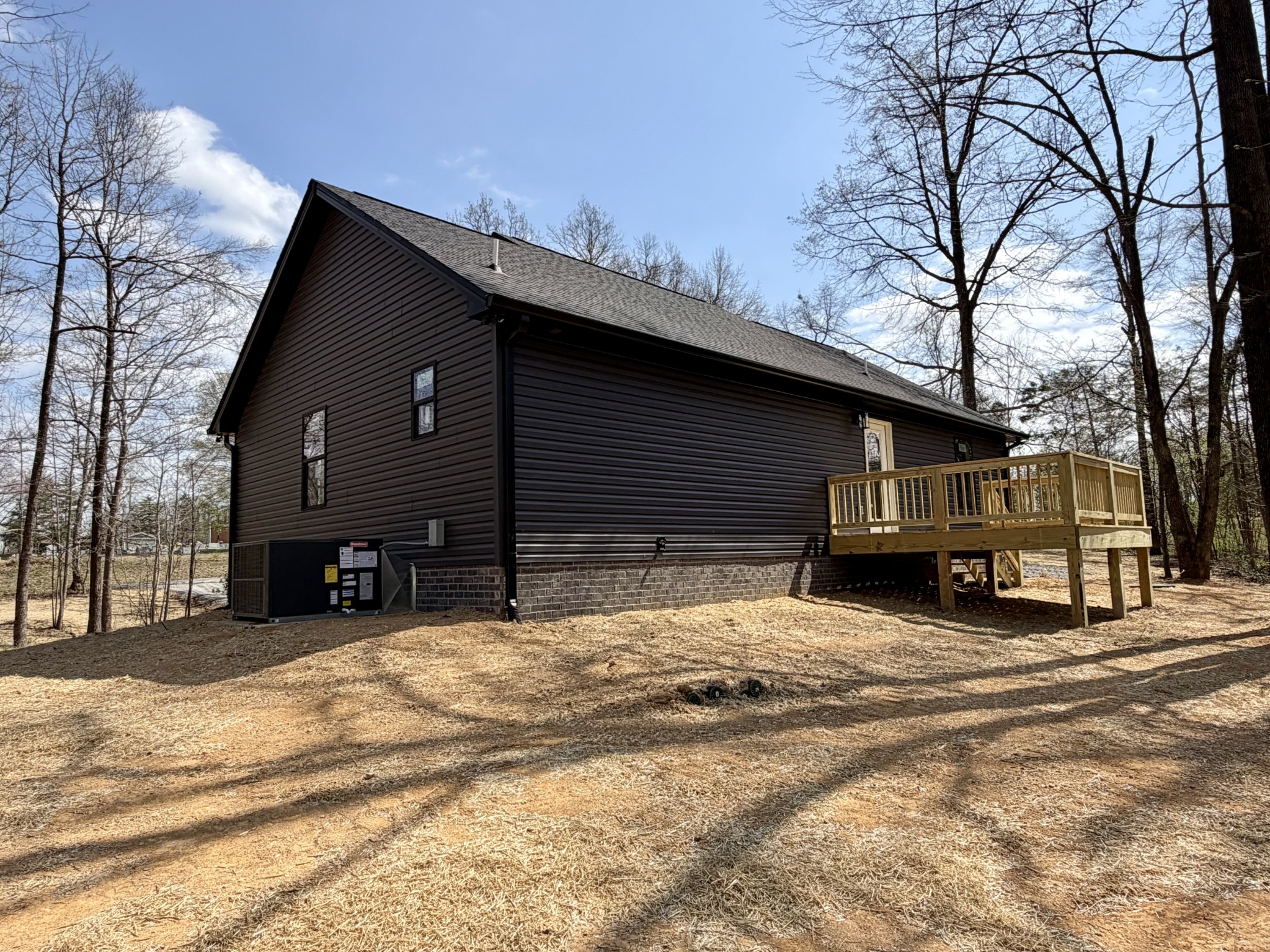 1007 Mt Olive Road Westmoreland, TN 37186 - Photo 9 of 31 a view of a house with a snow in the yard