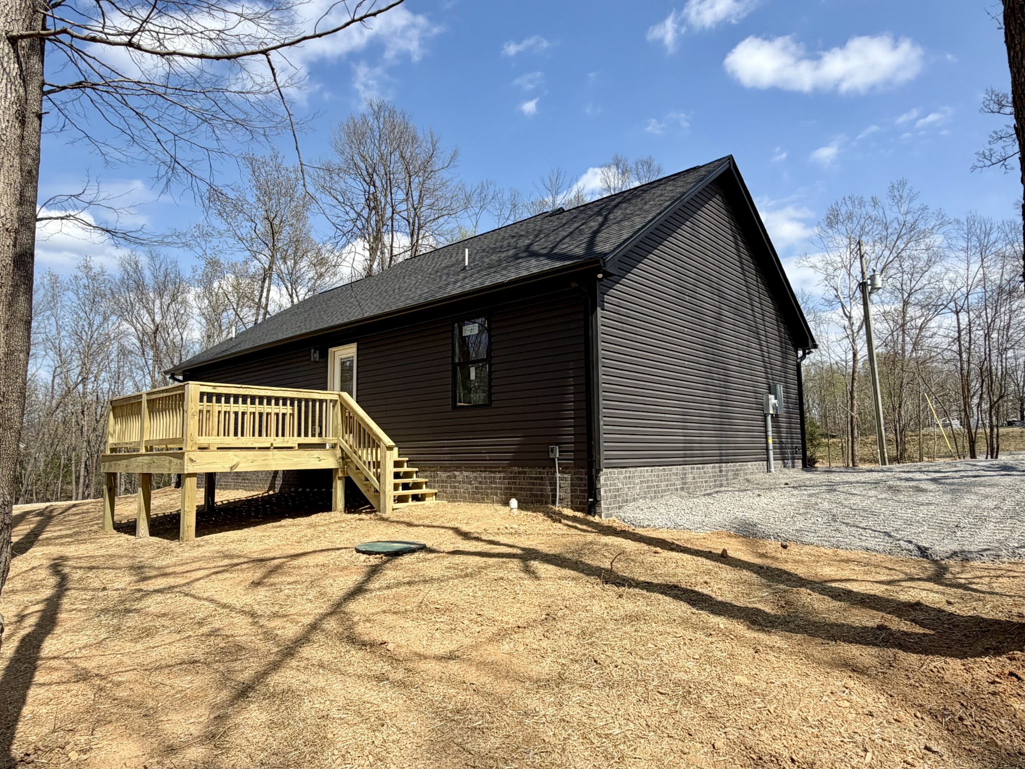 1007 Mt Olive Road Westmoreland, TN 37186 - Photo 10 of 31 a view of the house with snow on the road