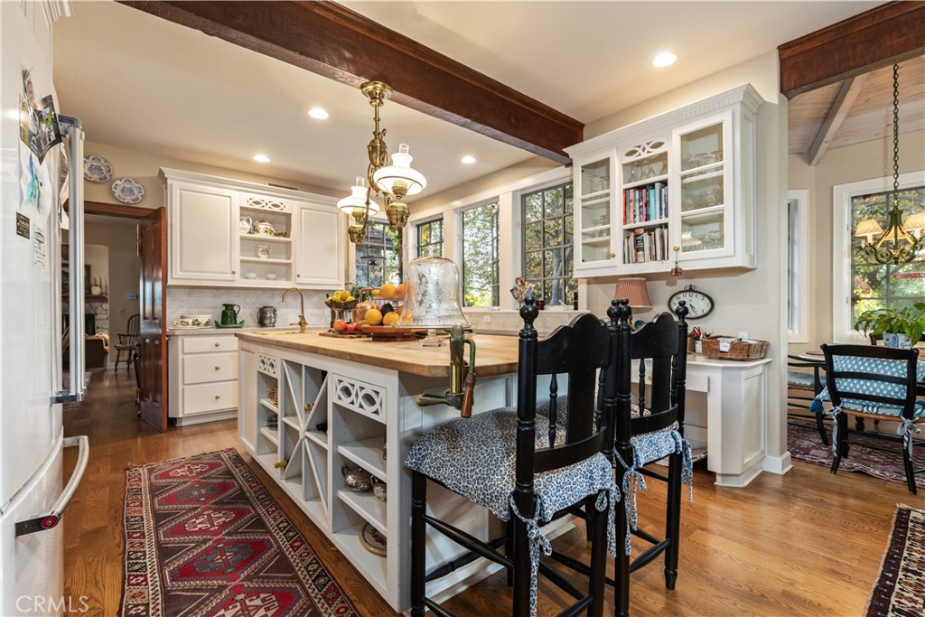 5415 Fairhills Road Paso Robles, CA 93446 - Photo 26 of 73 Lots of cabinets and counter space with bar-stool seating.