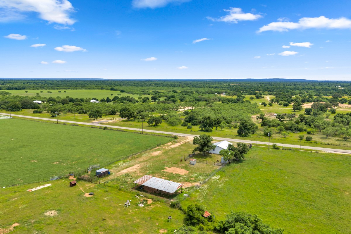 6311 Ranch Road 2241 Bluffton, TX 78607 - Photo 18 of 32 a view of an ocean and a yard