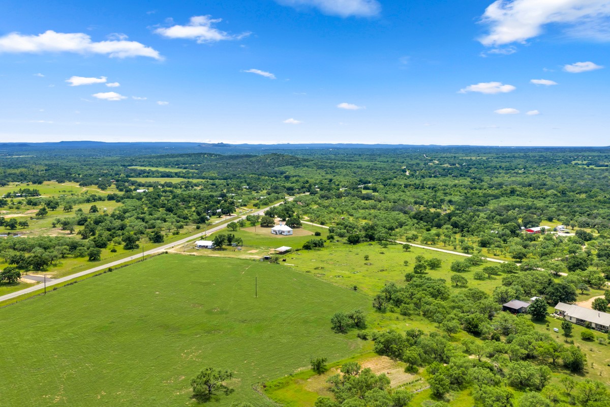 6311 Ranch Road 2241 Bluffton, TX 78607 - Photo 21 of 32 a view of a lake with a city