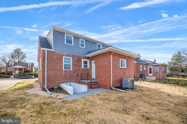 a view of a room with wooden walls
