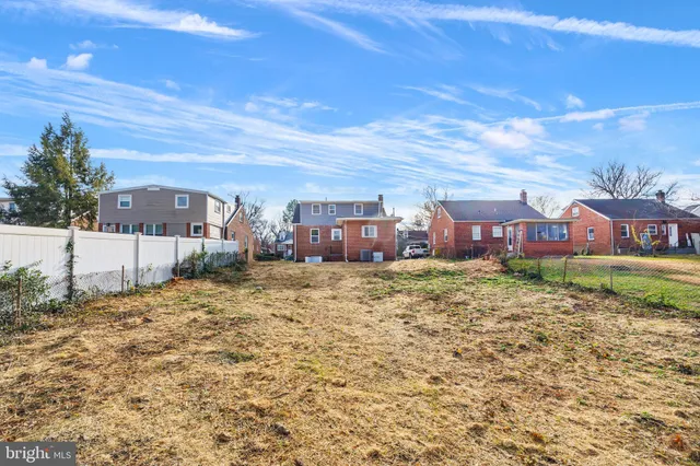 a picture of a room with a white wall and sign