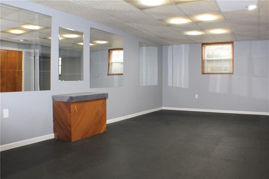 9462 Peebles Road Allison Park, PA 15101 - Photo 19 of 50 an empty room with wooden floor and windows