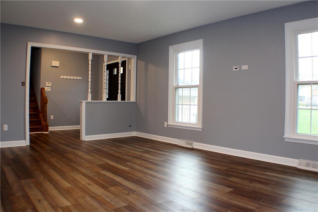 9462 Peebles Road Allison Park, PA 15101 - Photo 26 of 50 an empty room with wooden floor and windows